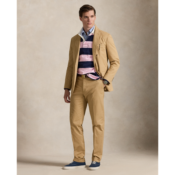 These suit trousers are crafted from custom-developed chino fabric, which is woven with extra stretch for added comfort. A special wash combined with a peached process imparts extraordinary softness along with a lightly broken-in appearance.