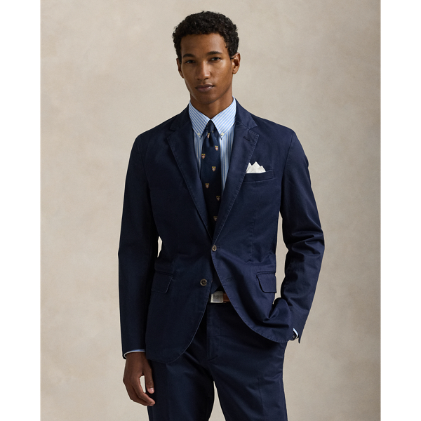 The Polo Unconstructed fit puts a modern spin on classic preppy style with a natural shoulder and light weight. This suit jacket is crafted with custom-developed chino fabric that was woven with extra stretch for added comfort. A special wash combined with a peached process imparts extraordinary softness along with a lightly broken-in appearance.
