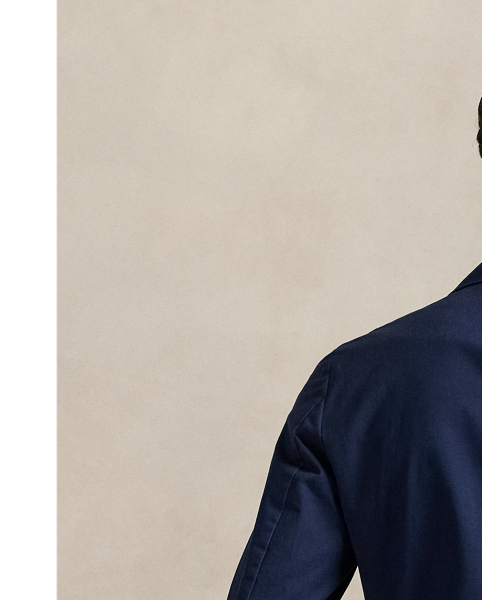 The Polo Unconstructed fit puts a modern spin on classic preppy style with a natural shoulder and light weight. This suit jacket is crafted with custom-developed chino fabric that was woven with extra stretch for added comfort. A special wash combined with a peached process imparts extraordinary softness along with a lightly broken-in appearance.