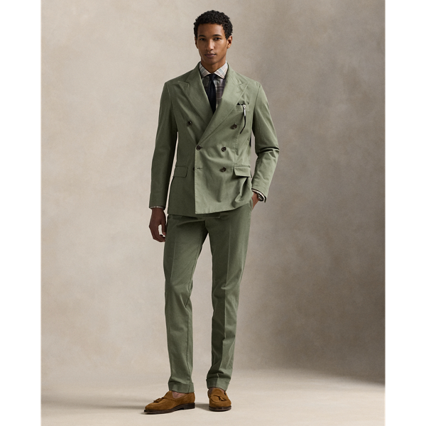 These pleated suit trousers are tailored in Portugal with a custom-developed chino cloth that is woven with stretch for added comfort. A garment-dye process adds subtle tonal variation.