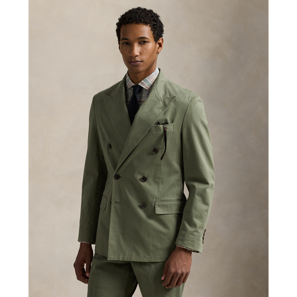 Our Polo Soft jacket puts a modern spin on classic preppy style with a natural shoulder, a slightly structured chest and partial lining. This double-breasted version is tailored in Portugal with a custom-developed chino cloth that is woven with stretch for added comfort. A garment-dye process adds subtle tonal variation.