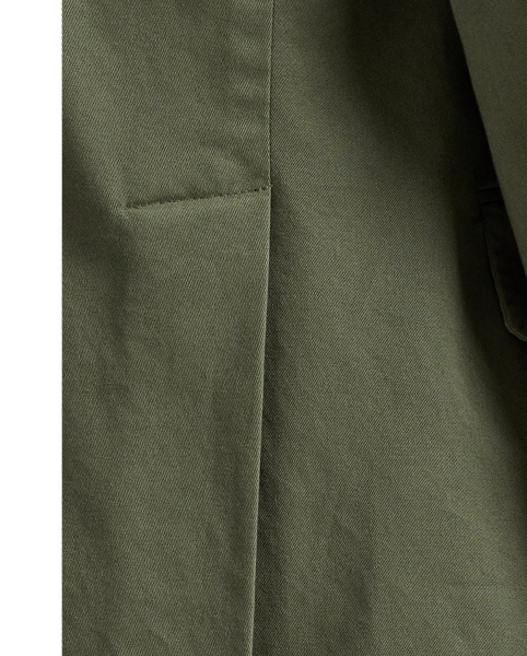 Our Polo Soft jacket puts a modern spin on classic preppy style with a natural shoulder, a slightly structured chest and partial lining. This double-breasted version is tailored in Portugal with a custom-developed chino cloth that is woven with stretch for added comfort. A garment-dye process adds subtle tonal variation.