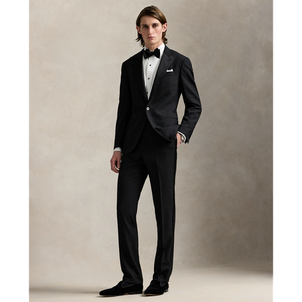 These flat-front trousers are masterfully tailored in Italy using wool barathea that was custom-developed for  Ralph Lauren Lauren. At the sides, it is finished with silk-blend stripes for a sleek and sophisticated finish.