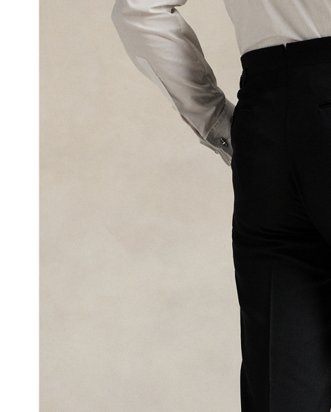 These flat-front trousers are masterfully tailored in Italy using wool barathea that was custom-developed for  Ralph Lauren Lauren. At the sides, it is finished with silk-blend stripes for a sleek and sophisticated finish.