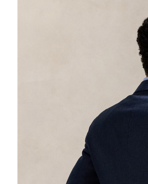 Our Polo jacket offers more structure in the chest and shoulders. This version is expertly tailored in Portugal using a textured linen-blend cloth that was custom-developed for  Ralph Lauren Lauren.