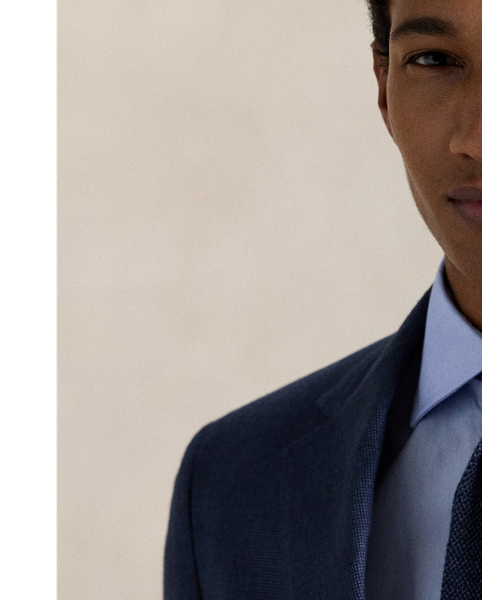 Our Polo jacket offers more structure in the chest and shoulders. This version is expertly tailored in Portugal using a textured linen-blend cloth that was custom-developed for  Ralph Lauren Lauren.
