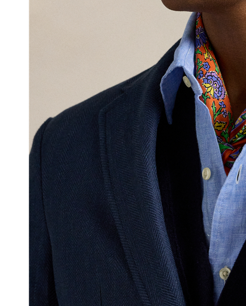 Our Polo blazer offers more structure in the chest and shoulders. This version is tailored in Portugal from a lightweight tweed cloth that was custom-woven with fine linen and wool.
