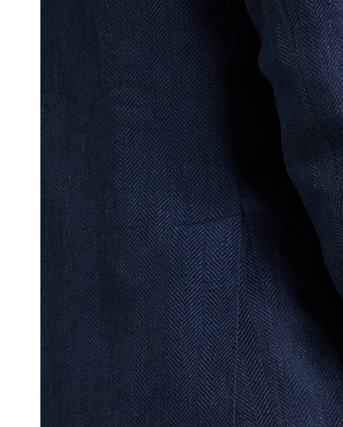 Our Polo blazer offers more structure in the chest and shoulders. This version is tailored in Portugal from a lightweight tweed cloth that was custom-woven with fine linen and wool.