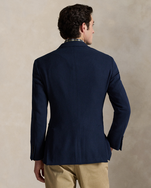 Our Polo blazer offers more structure in the chest and shoulders. This version is beautifully tailored in Portugal using a cotton-blend twill fabric that was custom-developed for Ralph Lauren Lauren.