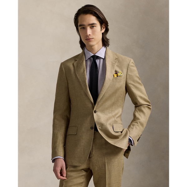 Our Polo blazer offers more structure in the chest and shoulders. This tick-weave version is tailored from a custom-developed fabric woven with lightweight linen and wool.