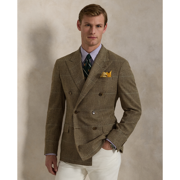 Our Polo suit jacket offers more structure in the chest and shoulders. This version is distinguished by custom-developed Italian tweed, which combines fine wool and silk for a rich textural depth.