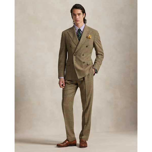 Distinguished by custom-developed Italian tweed, these pleated trousers showcase  Ralph Lauren Lauren's commitment to exceptional craftsmanship. The luxurious blend of fine wool and silk creates a rich textural depth, while expert tailoring ensures an impeccable fit, which exemplifies timeless sophistication.