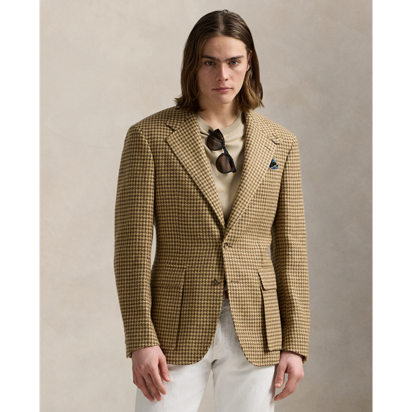 Created to mark the 50th anniversary of  Ralph Lauren Lauren, the RL67 jacket draws inspiration from a blazer that has been a treasured part of Mr Lauren's wardrobe since 1971. This reinterpretation is tailored in Italy from a custom-developed tweed that was masterfully woven with linen, wool and silk. At the undercollar, it is finished with supple suede.