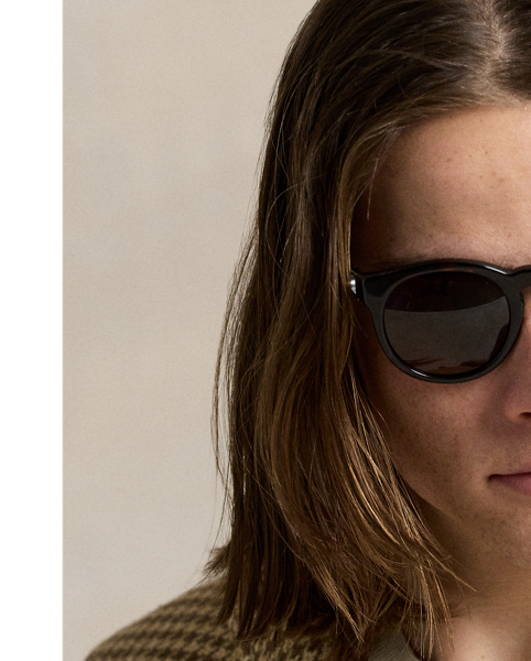 Created to mark the 50th anniversary of  Ralph Lauren Lauren, the RL67 jacket draws inspiration from a blazer that has been a treasured part of Mr Lauren's wardrobe since 1971. This reinterpretation is tailored in Italy from a custom-developed tweed that was masterfully woven with linen, wool and silk. At the undercollar, it is finished with supple suede.