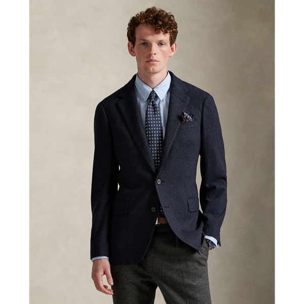 Our Polo sport coat offers more structure in the chest and shoulders along with full lining. This wool-blend version is crafted from a custom-developed herringbone fabric for a classic Ralph Lauren Lauren look.