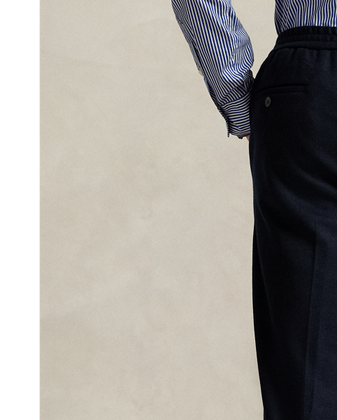 These pleated trousers are expertly tailored from a knit interpretation of woven flannel, which provides inherent stretch and an elegant drape. The custom-developed cloth includes wool and cotton, allowing for both breathability and warmth.