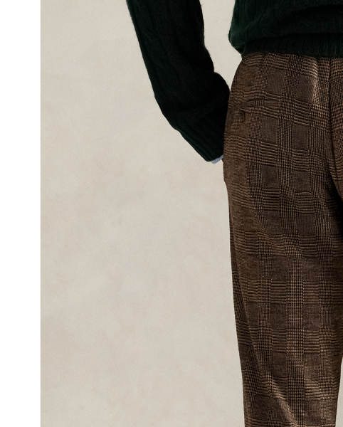 These pleated trousers are expertly crafted from glen plaid jersey, combining the comfort of sportswear with the sophisticated look of Polo tailoring.