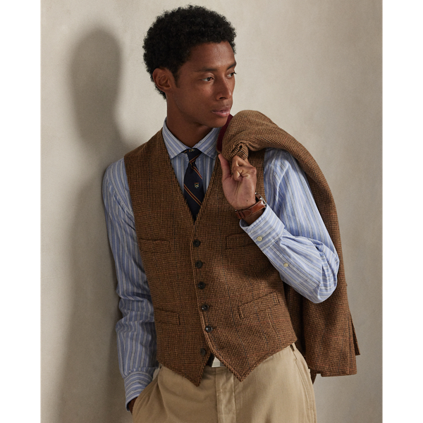 This waistcoat is tailored using a custom-developed wool cloth from Italy, which is punctuated with a subtle orange and teal overcheck.