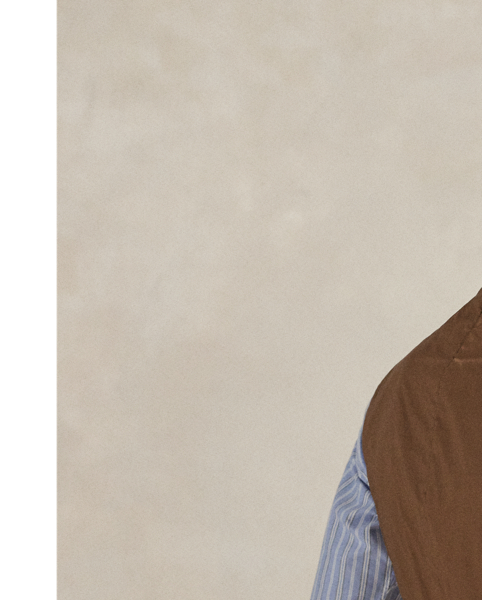 This waistcoat is tailored using a custom-developed wool cloth from Italy, which is punctuated with a subtle orange and teal overcheck.