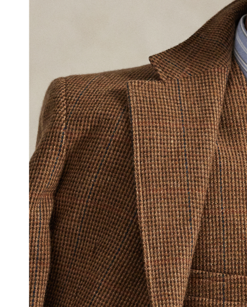 This waistcoat is tailored using a custom-developed wool cloth from Italy, which is punctuated with a subtle orange and teal overcheck.