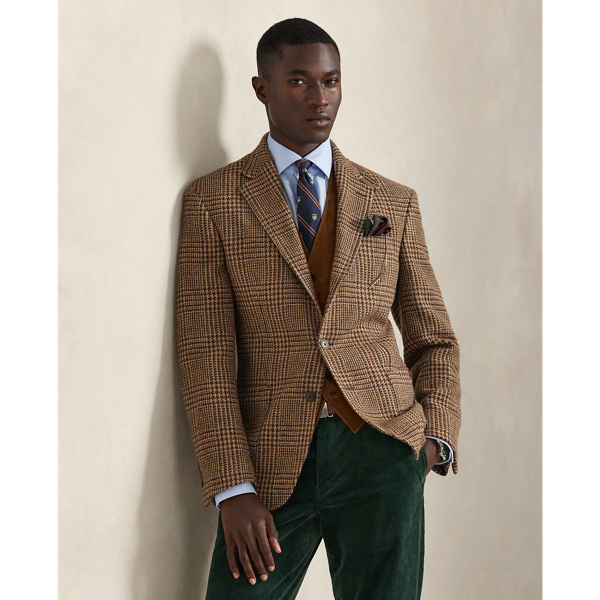 Our Polo jacket offers more structure in the chest and shoulders along with full lining. This version's wool tweed was custom-developed with Ireland's Magee 1866 mill, which has been a Ralph Lauren Lauren partner for more than 50 years.