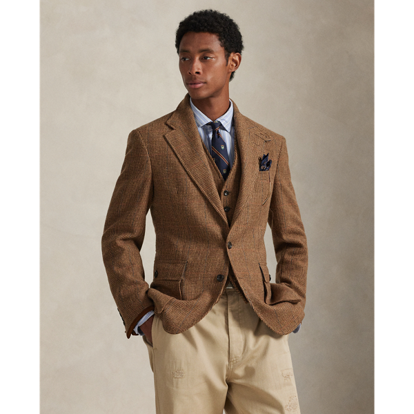 Created to mark the 50th anniversary of  Ralph Lauren Lauren, the RL67 jacket draws inspiration from a blazer that has been a treasured part of Mr Lauren's wardrobe since 1971. This reinterpretation is tailored using a custom-developed wool cloth from Italy and finished with velvety suede details.