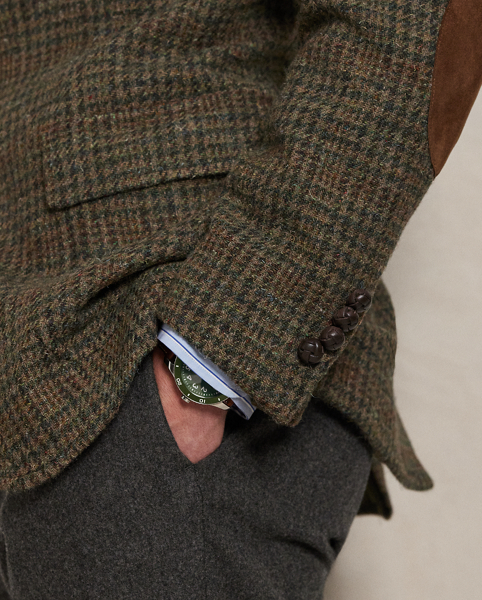 Our Polo blazer offers more structure in the chest and shoulders along with a full lining. This Glen plaid version is expertly tailored using a wool tweed fabric that was custom-developed with a storied Scottish mill. At the elbows and undercollar, it is detailed with velvety suede.