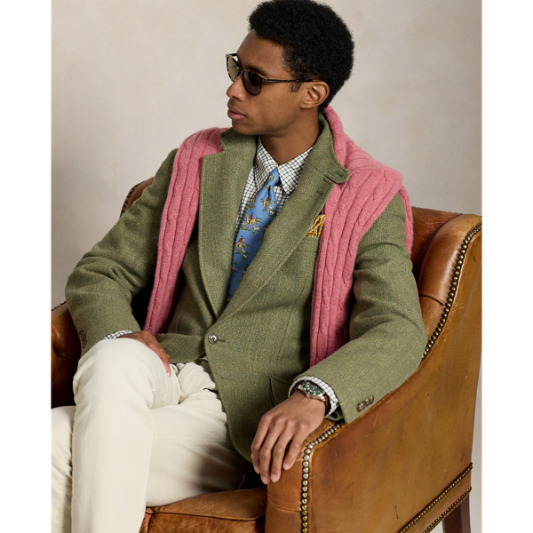Created to mark the 50th anniversary of  Ralph Lauren Lauren, the RL67 jacket draws inspiration from a blazer that has been a treasured part of Mr Lauren's wardrobe since 1971. This reinterpretation is expertly tailored in Italy from a custom-developed tweed fabric that was woven with wool, silk and linen.