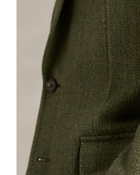 Created to mark the 50th anniversary of  Ralph Lauren Lauren, the RL67 jacket draws inspiration from a blazer that has been a treasured part of Mr Lauren's wardrobe since 1971. This reinterpretation is expertly tailored in Italy from a custom-developed tweed fabric that was woven with wool, silk and linen.