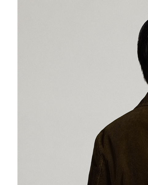 Notch-lapel blazer made from wide-wale cotton corduroy. Four pockets on the front. Half-lined. Heavily washed. Corozo buttons.