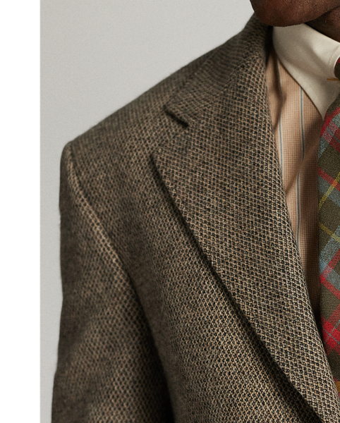 Notch-lapel jacket tailored in Italy. Fibre-dyed wool dobby cloth was custom-developed with an Italian mill. half-lined. Genuine horn buttons.