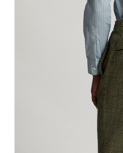 Slim-fitting trousers tailored in Italy. Wool herringbone cloth with a windowpane pattern. The cloth used in these trousers has been custom-developed with a storied Irish mill. half-lined. Genuine horn buttons.