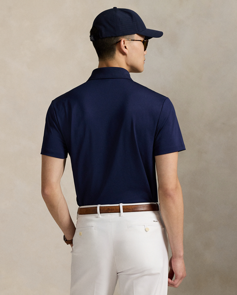 This stretch piqué Polo shirt is developed with moisture-wicking properties for enhanced comfort and features our iconic Polo Bear embroidered on the chest.