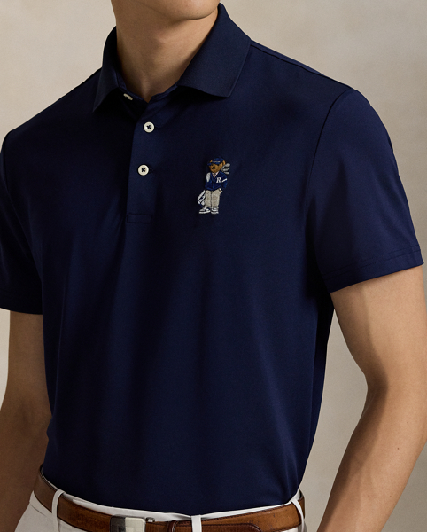 This stretch piqué Polo shirt is developed with moisture-wicking properties for enhanced comfort and features our iconic Polo Bear embroidered on the chest.