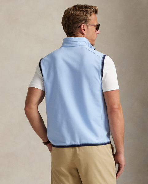 Perfect for lightweight layering, this gilet is crafted from stretch cotton-blend piqué. It's constructed with a contrasting woven panel on the front for a sleek, modern look.