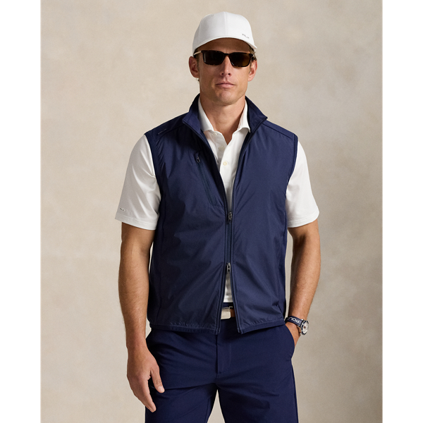 Perfect for lightweight layering, this gilet is crafted from stretch cotton-blend piqué. It's constructed with a contrasting woven panel on the front for a sleek, modern look.