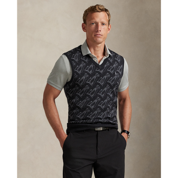 This sleeveless jumper is jacquard-knit with an all-over motif, which incorporates golf bags, flagsticks and our logo. It is made with COOLMAX fibres to help keep you cool, dry and comfortable.