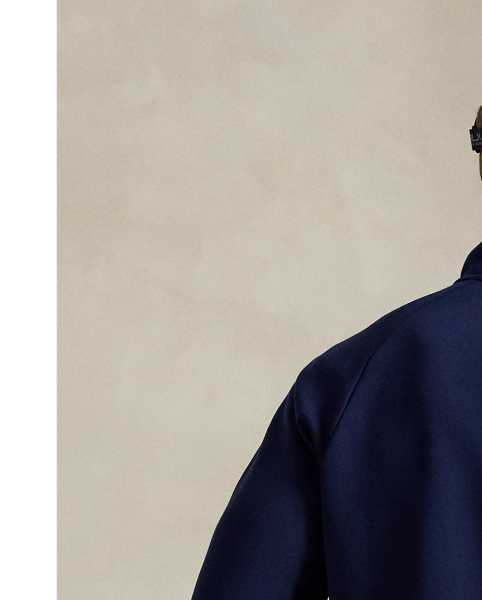 This mockneck jacket is crafted from a smooth double-knit fabric that's developed with a water-repellent finish to help keep you dry in rainy weather.