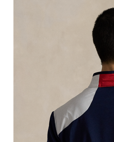Designed for our 2025 US Ryder Cup Team Collection, this pullover is based on a layering option we developed for the team's uniform and updated with the RLX logo. It is crafted from a stretch double-knit fabric featuring wool and includes a quilted panel on the front for additional warmth.