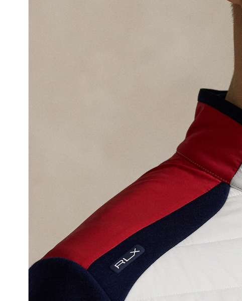 Designed for our 2025 US Ryder Cup Team Collection, this pullover is based on a layering option we developed for the team's uniform and updated with the RLX logo. It is crafted from a stretch double-knit fabric featuring wool and includes a quilted panel on the front for additional warmth.