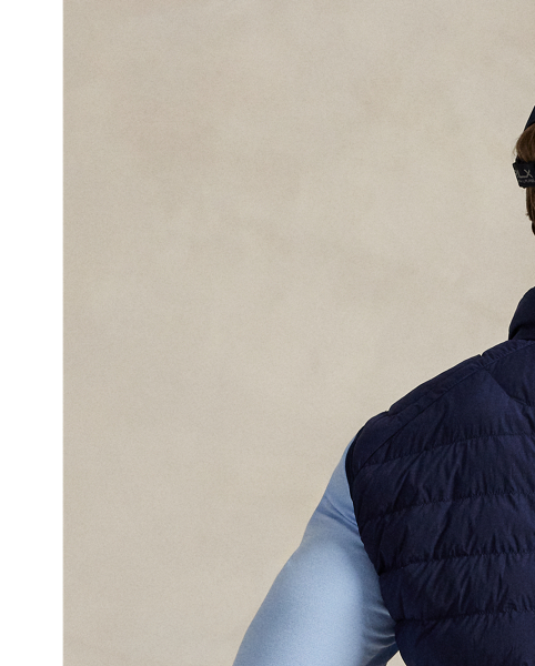 Crafted from water-repellent fabric, this lightweight gilet is ergonomically panelled with stretch jersey for ease of movement and insulated with down-alternative fill. It features slots on the waist pockets for hand warmers as well as a scorecard compartment in the interior.