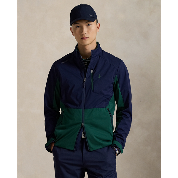 This colour-blocked jacket is crafted from a lightweight interlock fabric, which is both water-repellent and breathable. It also packs into its own pocket for on-the-go convenience.