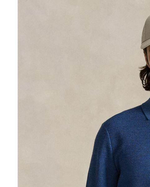 This jumper combines a silhouette inspired by our timeless Polo shirt with moisture-wicking COOLMAX fibres to help keep you cool, dry and comfortable. It is knit using a piqué stitch for subtle texture and finished with genuine mother-of-pearl buttons, which we have custom-developed with our logo.
