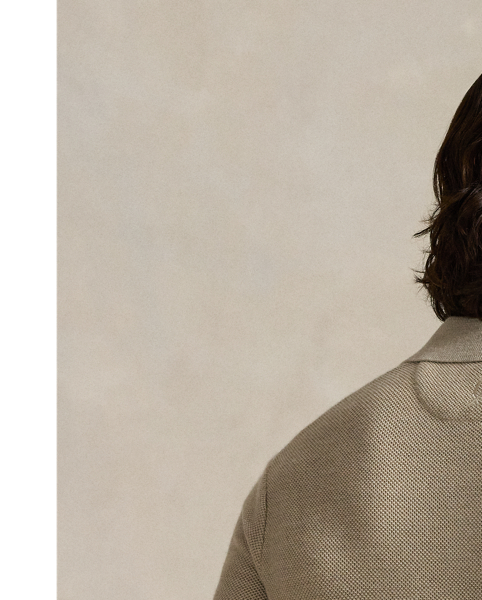 This jumper combines a silhouette inspired by our timeless Polo shirt with moisture-wicking COOLMAX fibres to help keep you cool, dry and comfortable. It is knit using a piqué stitch for subtle texture and finished with genuine mother-of-pearl buttons, which we have custom-developed with our logo.