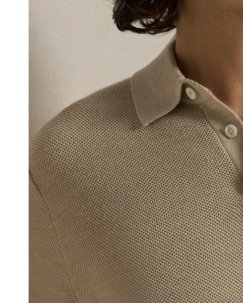 This jumper combines a silhouette inspired by our timeless Polo shirt with moisture-wicking COOLMAX fibres to help keep you cool, dry and comfortable. It is knit using a piqué stitch for subtle texture and finished with genuine mother-of-pearl buttons, which we have custom-developed with our logo.