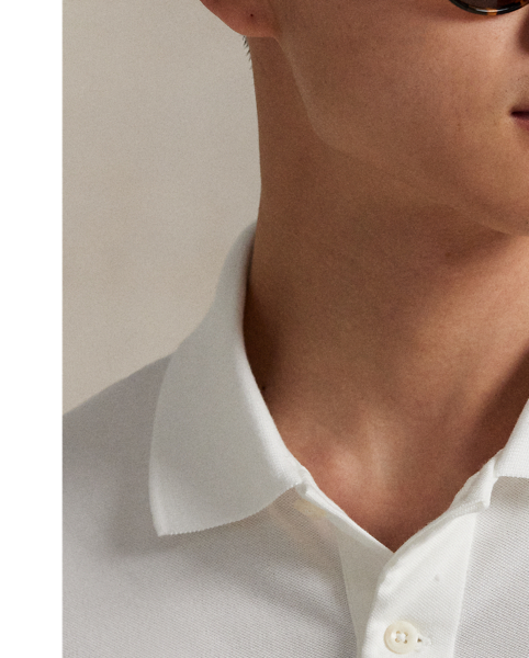 This Polo shirt unites moisture-wicking properties with stretch cotton mesh for all-day comfort. For a double dose of signature style, it features both the RLX logo as well as our signature Pony.