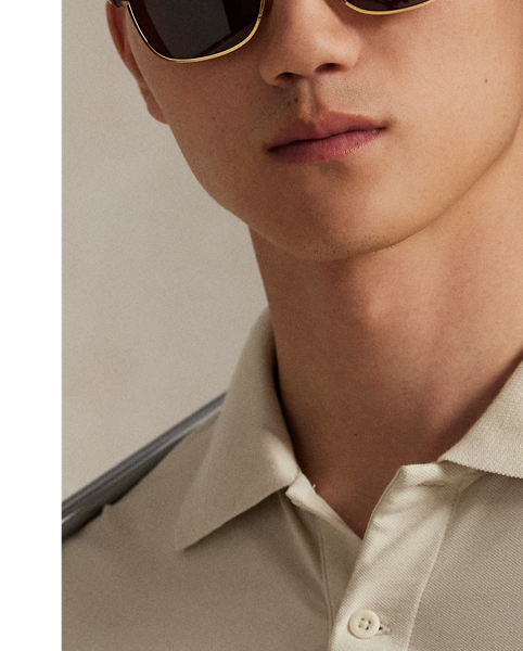This Polo shirt unites moisture-wicking properties with stretch cotton mesh for all-day comfort. For a double dose of signature style, it features both the RLX logo as well as our signature Pony.