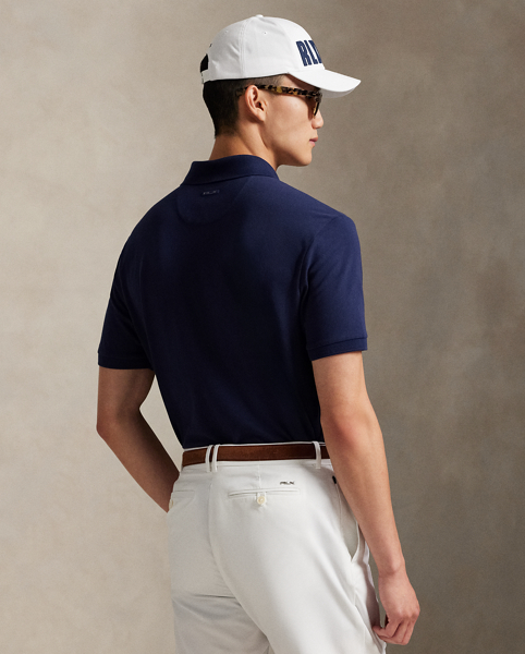 This Polo shirt unites moisture-wicking properties with stretch cotton mesh for all-day comfort. For a double dose of signature style, it features both the RLX logo as well as our signature Pony.