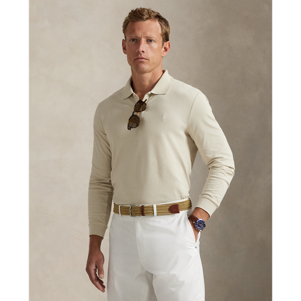 This Polo shirt unites moisture-wicking properties with stretch cotton mesh for all-day comfort. For a double dose of signature style, it features both the RLX logo as well as our signature Pony.