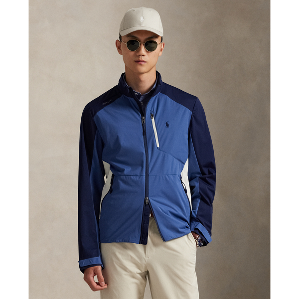 This jacket is crafted from a lightweight fabric that is both water-repellent and breathable. Additionally, it packs into its own pocket for on-the-go convenience.